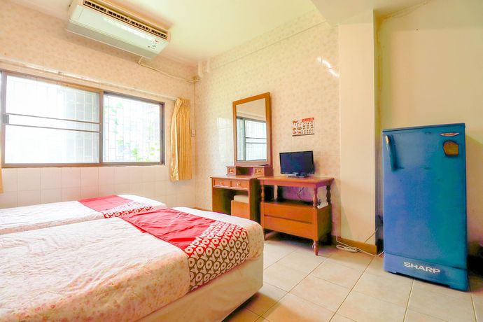 Imagen de la habitación del Hotel Oyo 583 Sweethome Guest House. Foto 5