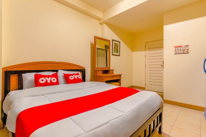 Imagen de la habitación del Hotel Oyo 583 Sweethome Guest House. Foto 9