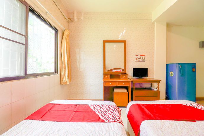 Imagen de la habitación del Hotel Oyo 583 Sweethome Guest House. Foto 11