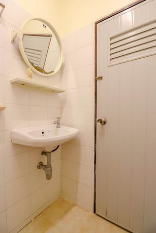 Imagen de la habitación del Hotel Oyo 583 Sweethome Guest House. Foto 16