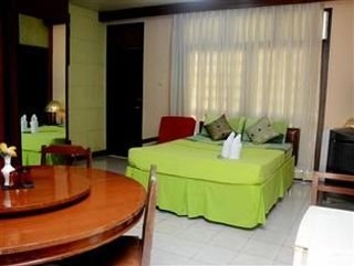 Imagen de la habitación del Hotel Oyo 599 Palawan Village. Foto 6