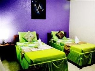Imagen de la habitación del Hotel Oyo 599 Palawan Village. Foto 9