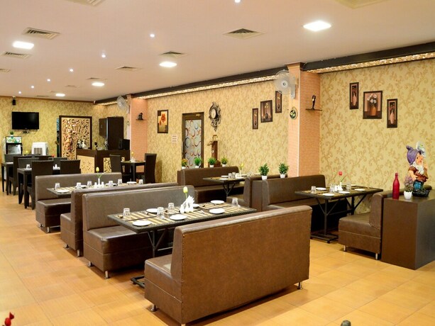 Imagen del bar/restaurante del Hotel Oyo 6012 Rockwell. Foto 5