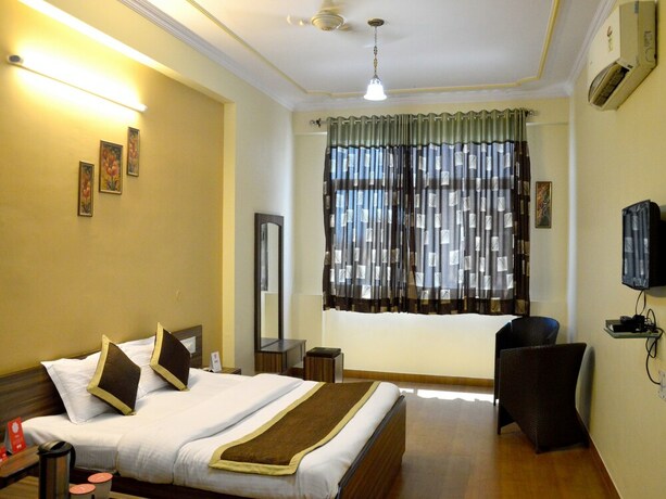 Imagen de la habitación del Hotel Oyo 6012 Rockwell. Foto 11