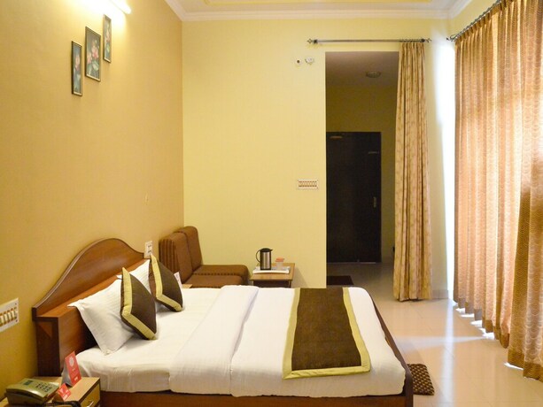 Imagen de la habitación del Hotel Oyo 6012 Rockwell. Foto 13
