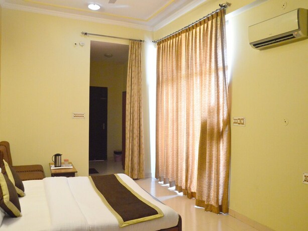 Imagen de la habitación del Hotel Oyo 6012 Rockwell. Foto 14