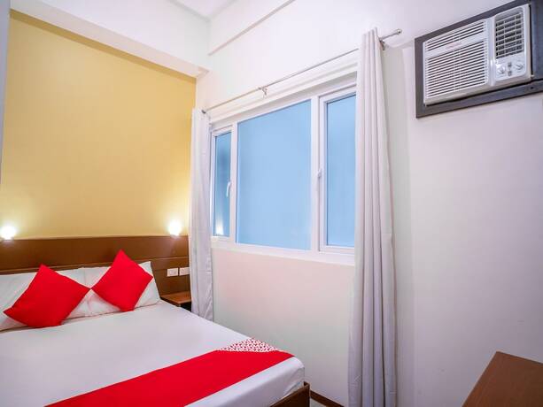 Imagen de la habitación del Hotel Oyo 641 Traveller's Inn Matina Pangi. Foto 15