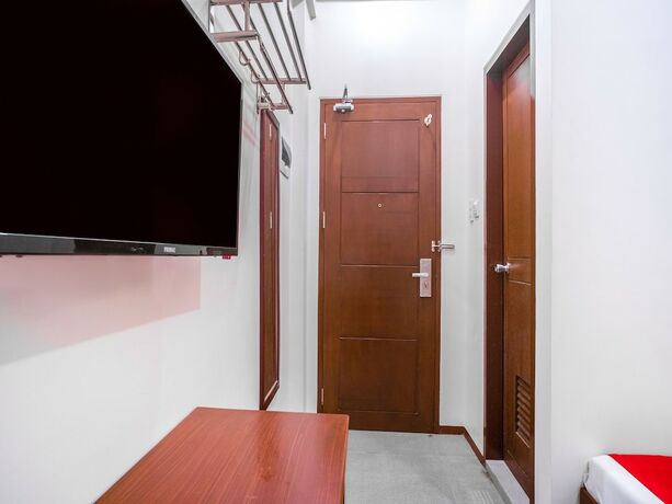 Imagen de la habitación del Hotel Oyo 641 Traveller's Inn Matina Pangi. Foto 16