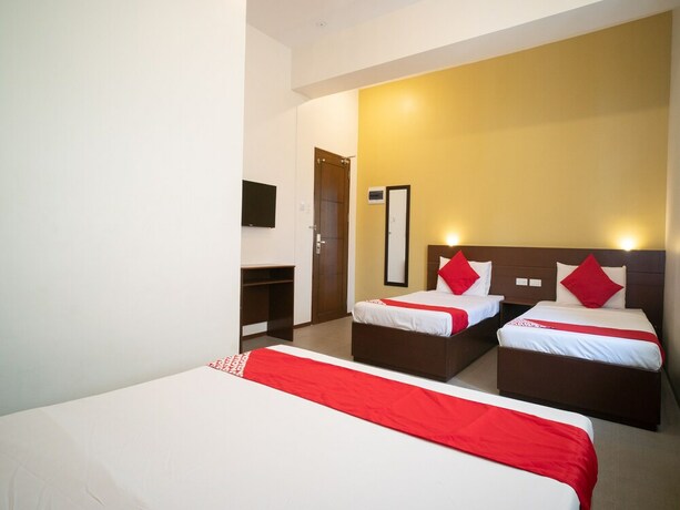 Imagen de la habitación del Hotel Oyo 641 Traveller's Inn Matina Pangi. Foto 18