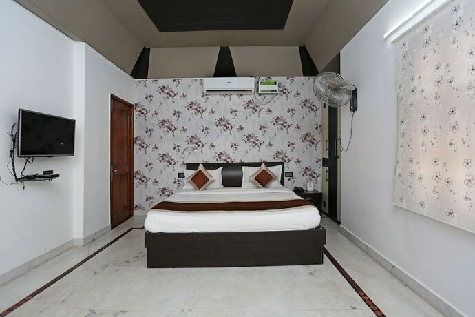 Imagen de la habitación del Hotel Oyo 6680 Galaxy International. Foto 2