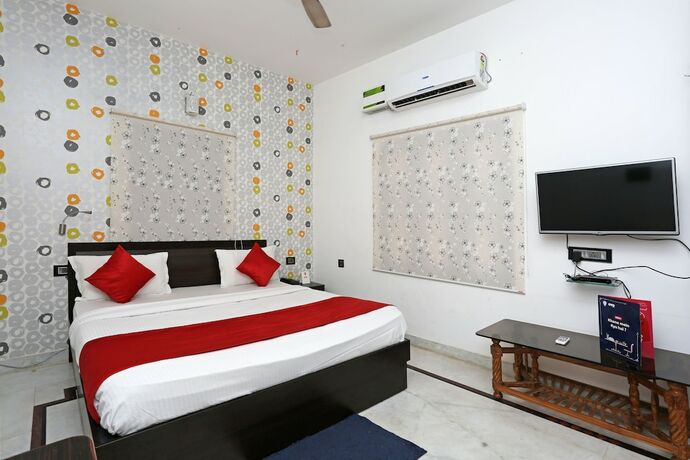 Imagen de la habitación del Hotel Oyo 6680 Galaxy International. Foto 5