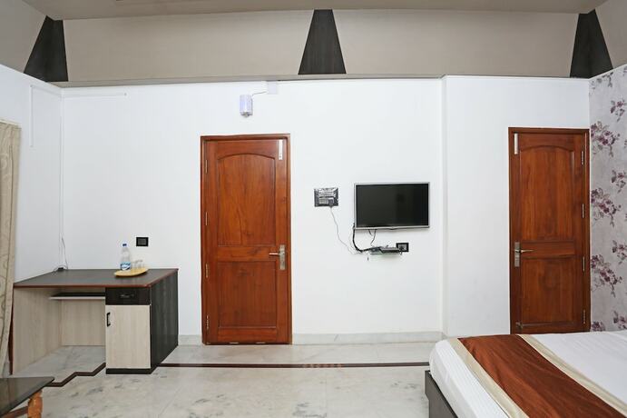 Imagen de la habitación del Hotel Oyo 6680 Galaxy International. Foto 8