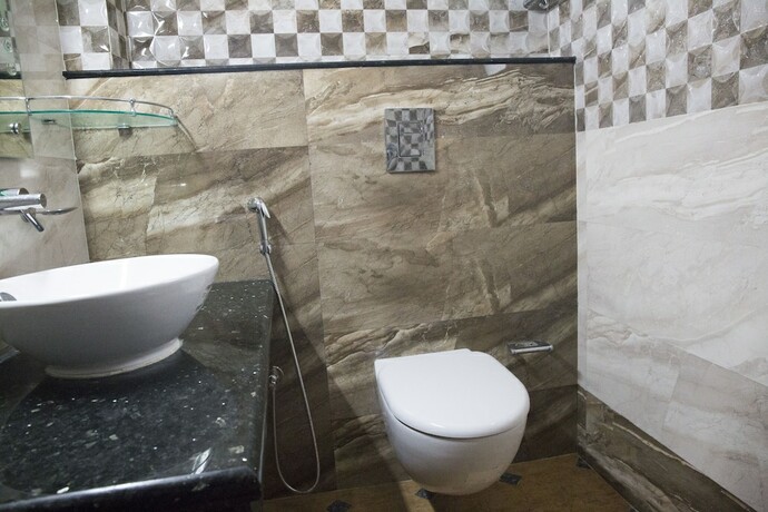 Imagen de la habitación del Hotel Oyo 6680 Galaxy International. Foto 10