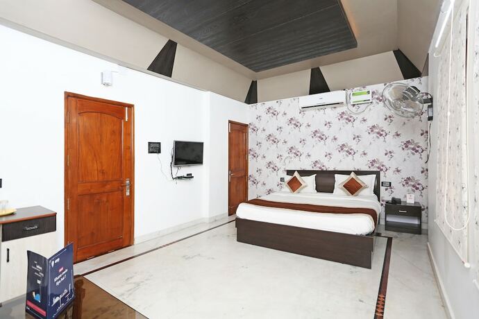 Imagen de la habitación del Hotel Oyo 6680 Galaxy International. Foto 14