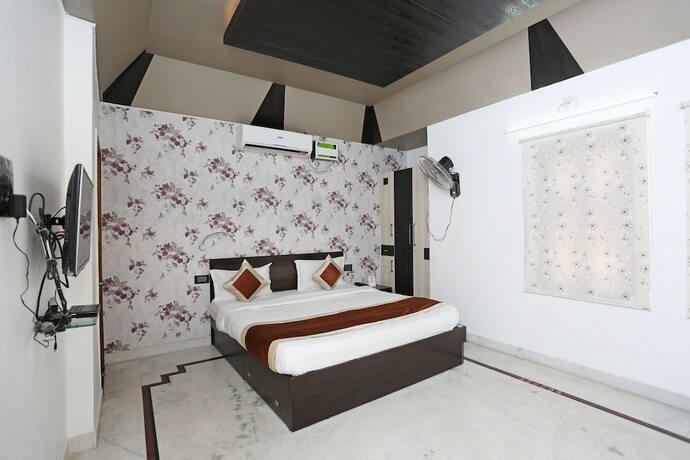 Imagen de la habitación del Hotel Oyo 6680 Galaxy International. Foto 15