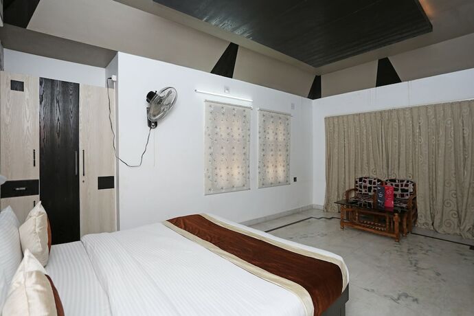 Imagen de la habitación del Hotel Oyo 6680 Galaxy International. Foto 16