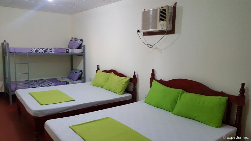 Imagen de la habitación del Hotel Oyo 671 Natua's Cabin. Foto 13