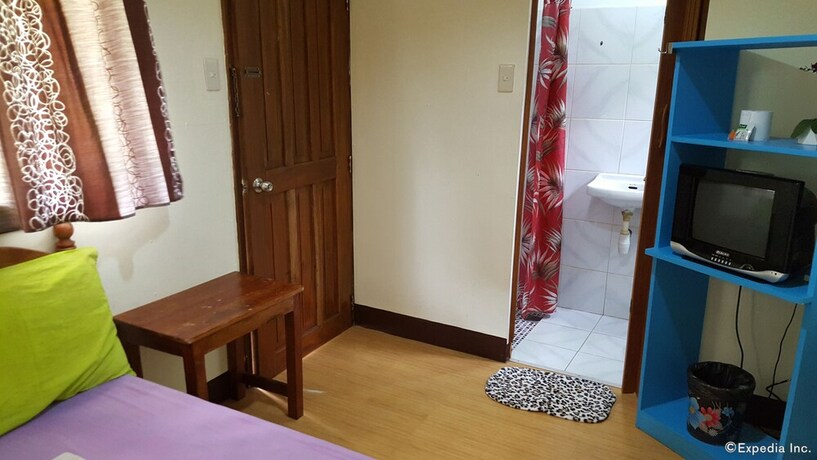 Imagen de la habitación del Hotel Oyo 671 Natua's Cabin. Foto 14