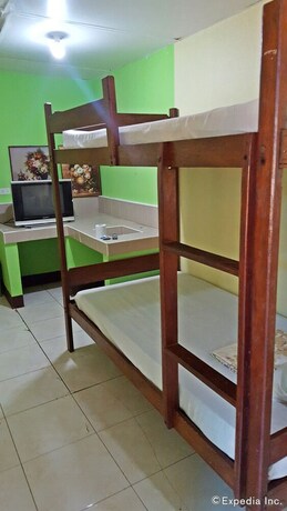 Imagen de la habitación del Hotel Oyo 671 Natua's Cabin. Foto 15
