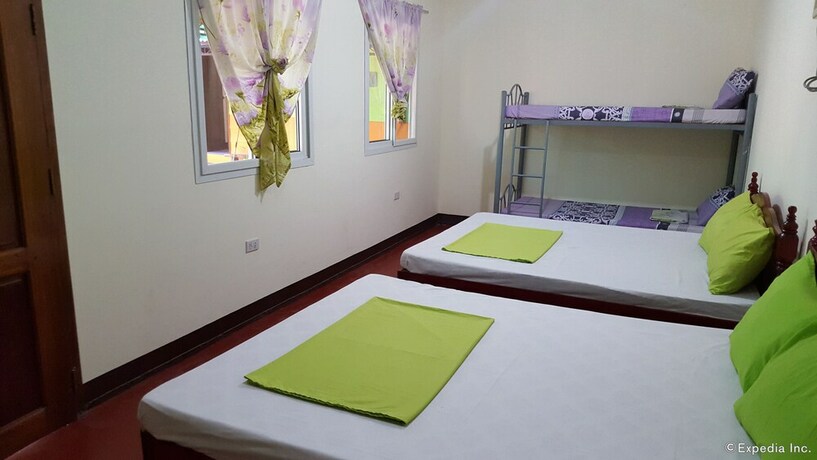 Imagen de la habitación del Hotel Oyo 671 Natua's Cabin. Foto 17