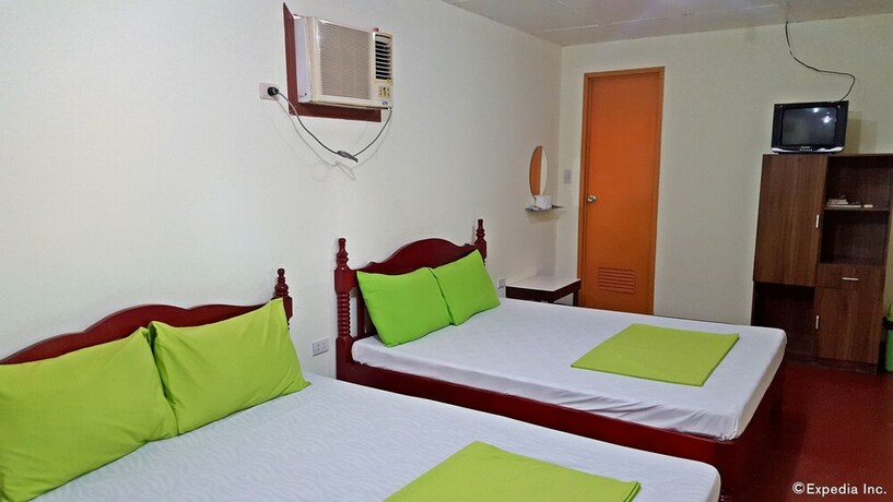 Imagen de la habitación del Hotel Oyo 671 Natua's Cabin. Foto 19