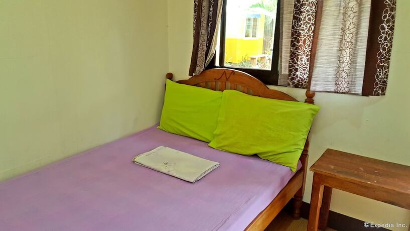 Imagen de la habitación del Hotel Oyo 671 Natua's Cabin. Foto 20