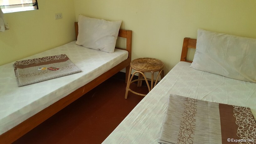 Imagen de la habitación del Hotel Oyo 671 Natua's Cabin. Foto 21
