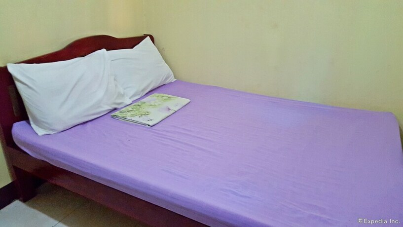 Imagen de la habitación del Hotel Oyo 671 Natua's Cabin. Foto 22