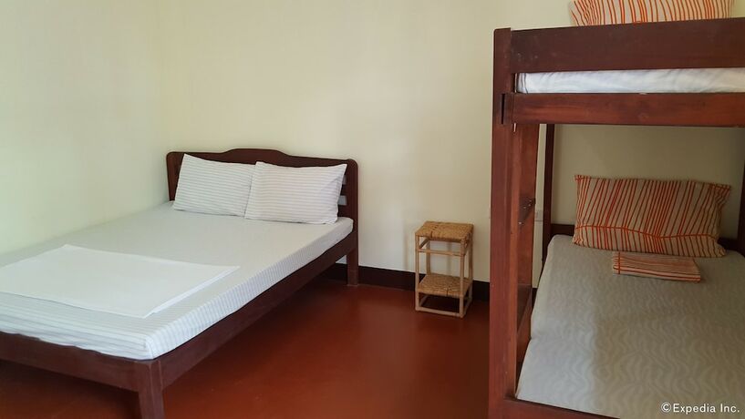 Imagen de la habitación del Hotel Oyo 671 Natua's Cabin. Foto 27