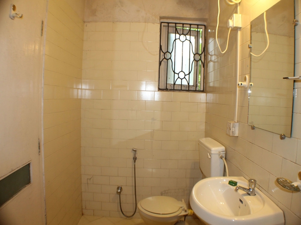 Imagen de la habitación del Hotel Oyo 6744 Stayout Sunny Holiday Homes. Foto 13