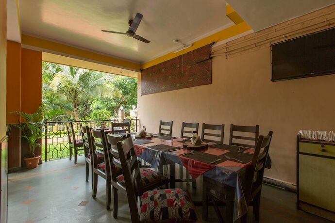 Imagen del bar/restaurante del Hotel Oyo 6807 Picnic Plaza. Foto 18