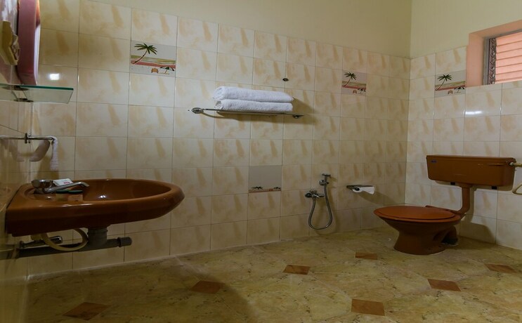 Imagen de la habitación del Hotel Oyo 6807 Picnic Plaza. Foto 24