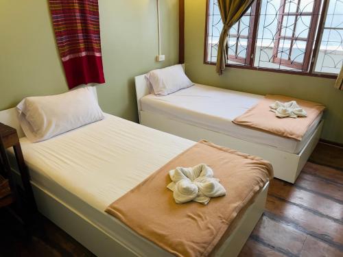 Imagen de la habitación del Hotel Oyo 691 Donmuang Boutique House. Foto 17