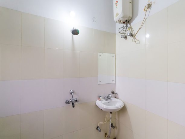 Imagen de la habitación del Hotel Oyo 6996 Near Beltola. Foto 15