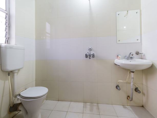 Imagen de la habitación del Hotel Oyo 6996 Near Beltola. Foto 16