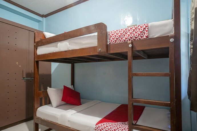 Imagen de la habitación del Hotel Oyo 702 Queens Hometel. Foto 8