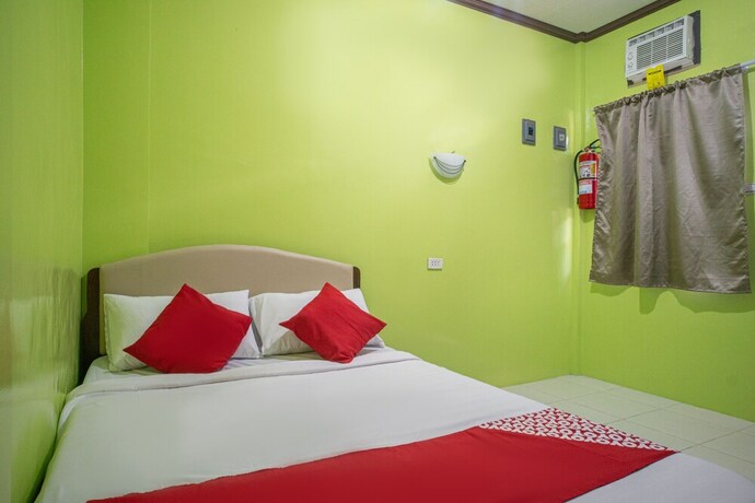 Imagen de la habitación del Hotel Oyo 702 Queens Hometel. Foto 9