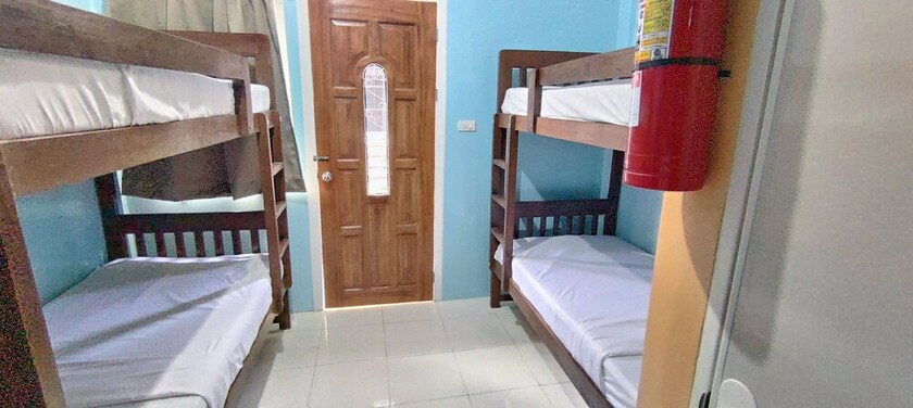 Imagen de la habitación del Hotel Oyo 702 Queens Hometel. Foto 12