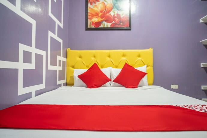 Imagen de la habitación del Hotel Oyo 702 Queens Hometel. Foto 13