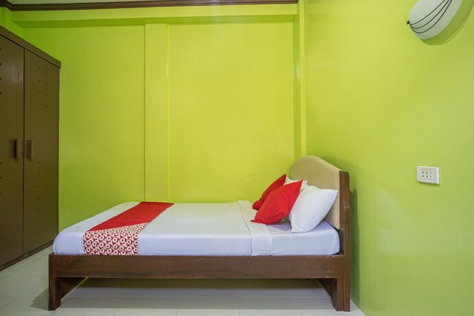 Imagen de la habitación del Hotel Oyo 702 Queens Hometel. Foto 14