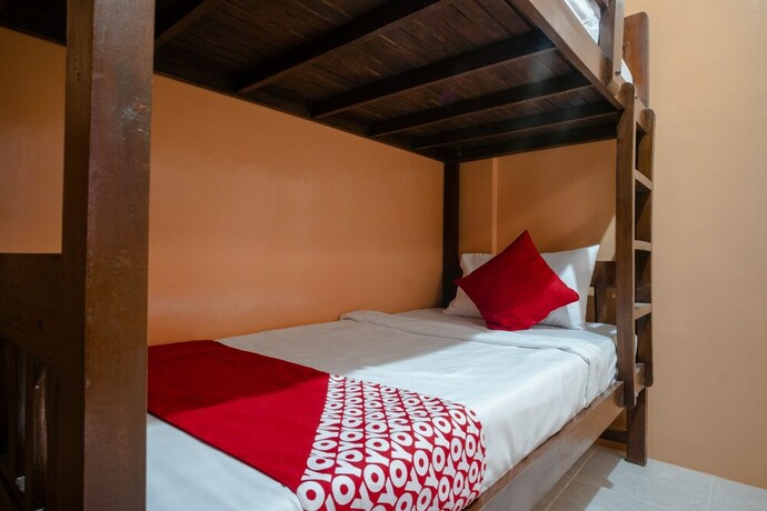 Imagen de la habitación del Hotel Oyo 702 Queens Hometel. Foto 18