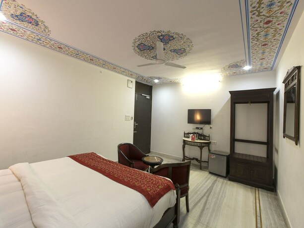 Imagen de la habitación del Hotel Oyo 7152 Gumaan Heritage. Foto 11