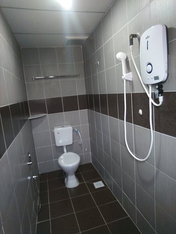 Imagen de la habitación del Hotel Oyo 721 Silibin Times Inn. Foto 5