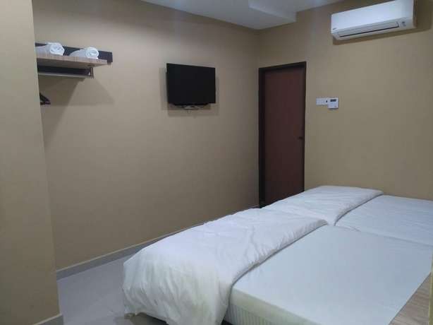 Imagen de la habitación del Hotel Oyo 721 Silibin Times Inn. Foto 10