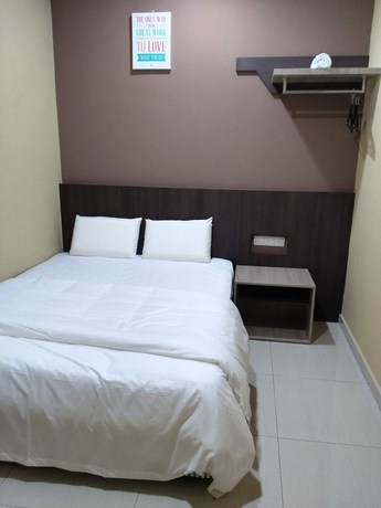 Imagen de la habitación del Hotel Oyo 721 Silibin Times Inn. Foto 11