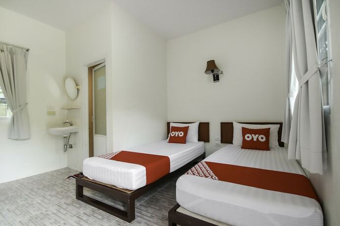 Imagen de la habitación del Hotel Oyo 75312 Banana Lodge. Foto 18