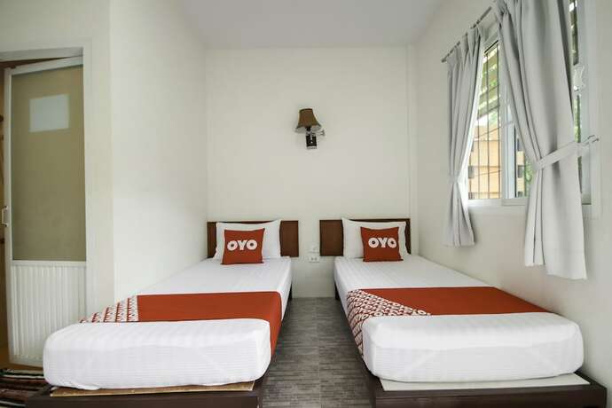 Imagen de la habitación del Hotel Oyo 75312 Banana Lodge. Foto 19