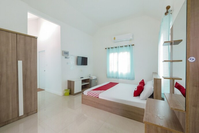Imagen de la habitación del Hotel Oyo 75339 Full Frame Resort. Foto 4