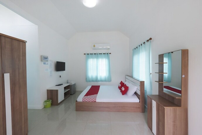 Imagen de la habitación del Hotel Oyo 75339 Full Frame Resort. Foto 8