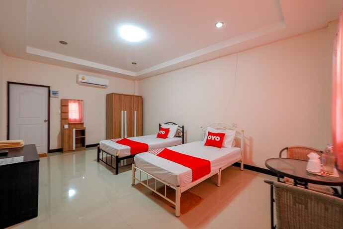 Imagen de la habitación del Hotel Oyo 75339 Full Frame Resort. Foto 10